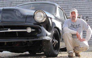 Kirt Rebello with his Kustom 1954 Chevrolet that he built.